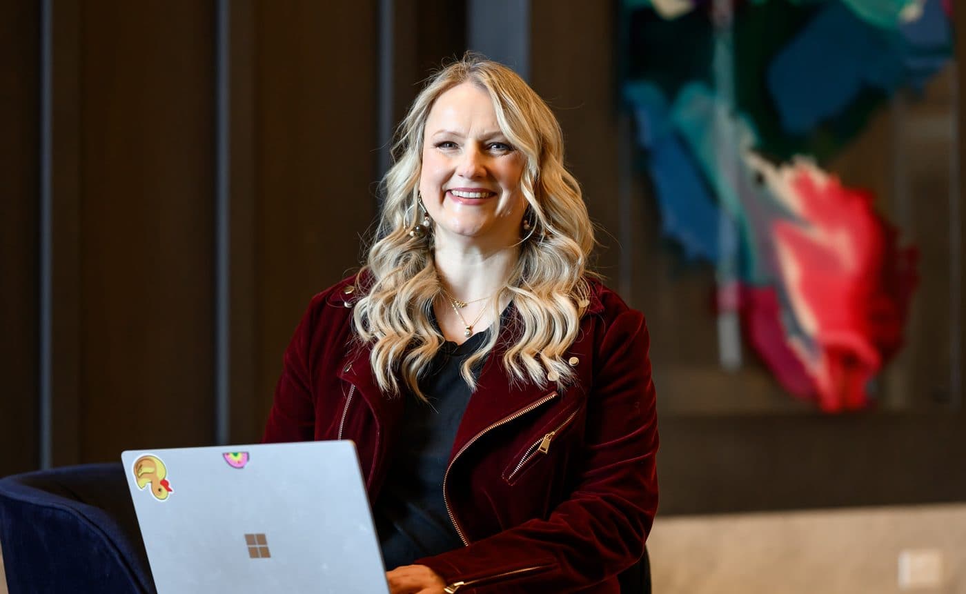 Nina Christian at her laptop